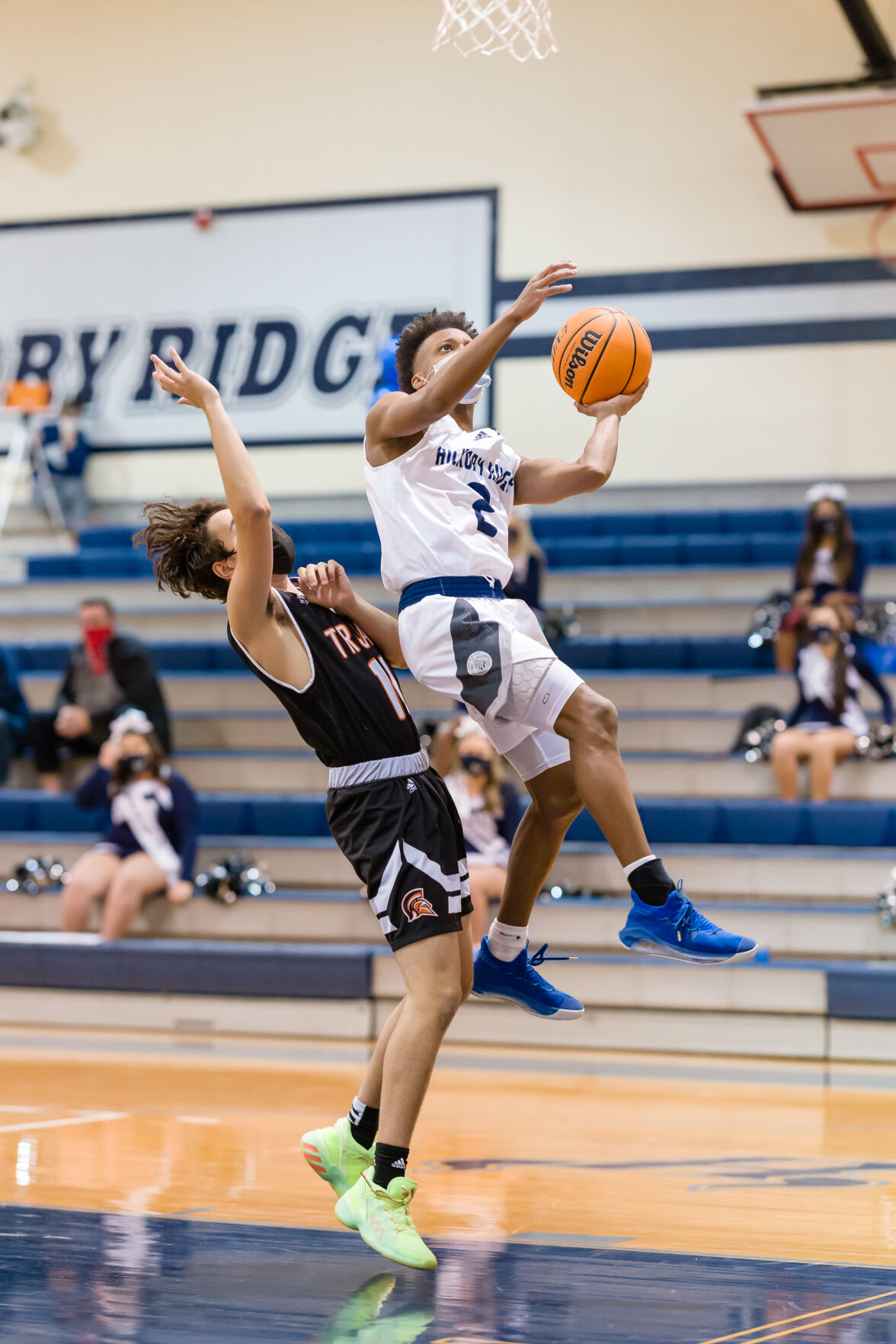 Boys Basketball: Hickory Ridge RaginÕ Bulls defeated the Northwest Cabarrus Trojans 64-56.